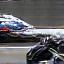 Damaged racing car on track